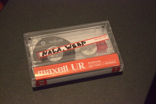 A cassette tape with a label that says 'nala.webp' in sharpie.